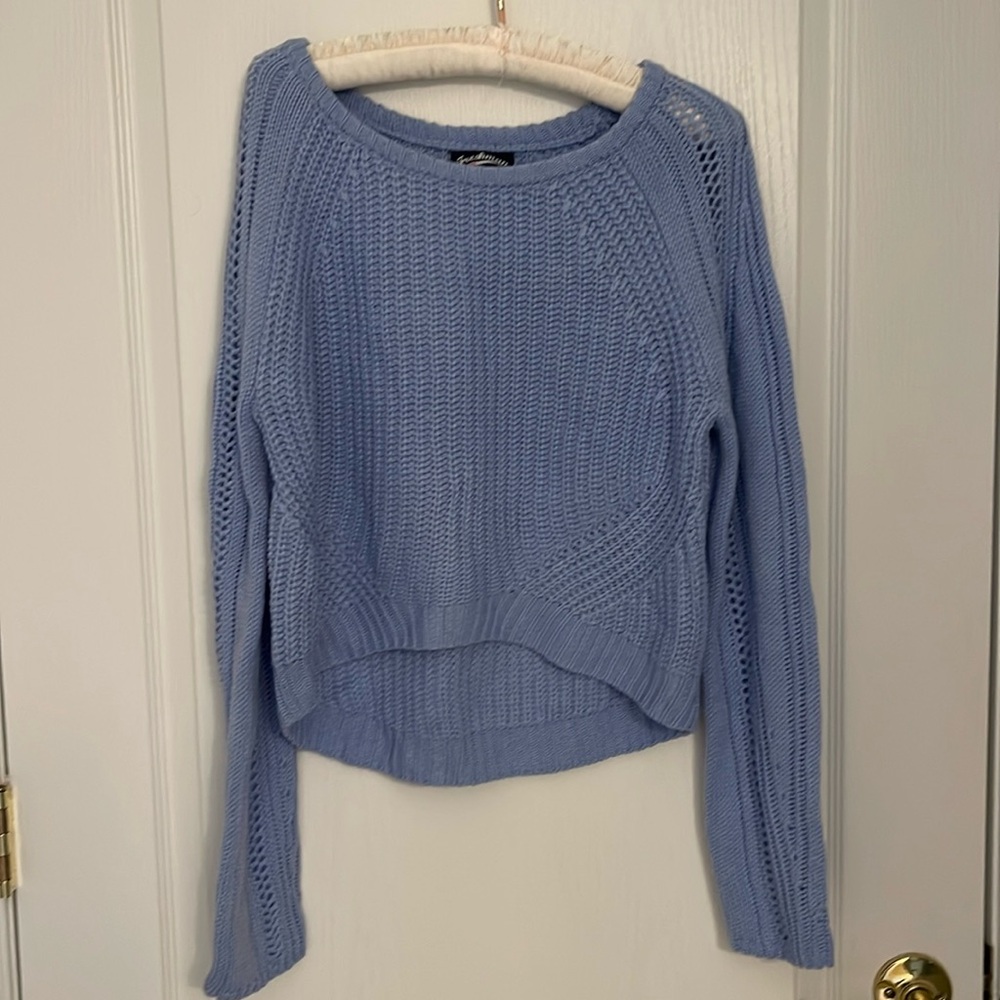 Light blue medium sweater. Like new.